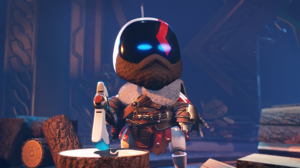 This image shows a Kratos-like Bot facing the camera, tightly gripping his Leviathan Axe, which hovers above a tree stump.