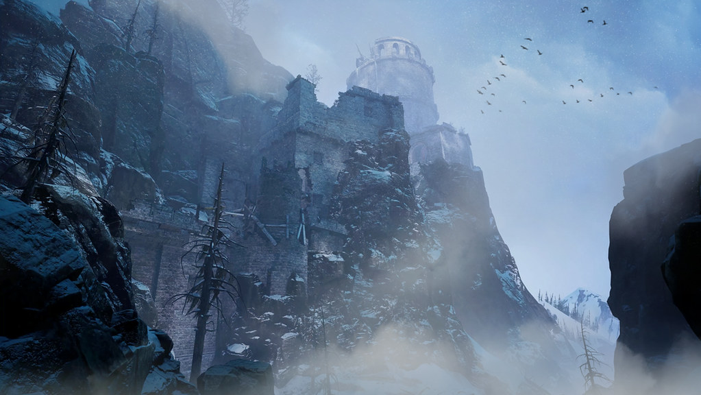 This image shows a crumbling castle built out of a mountainside stretches into the skies above. Fog permeates its lower reaches, while a flock of birds soar over the rooftops.