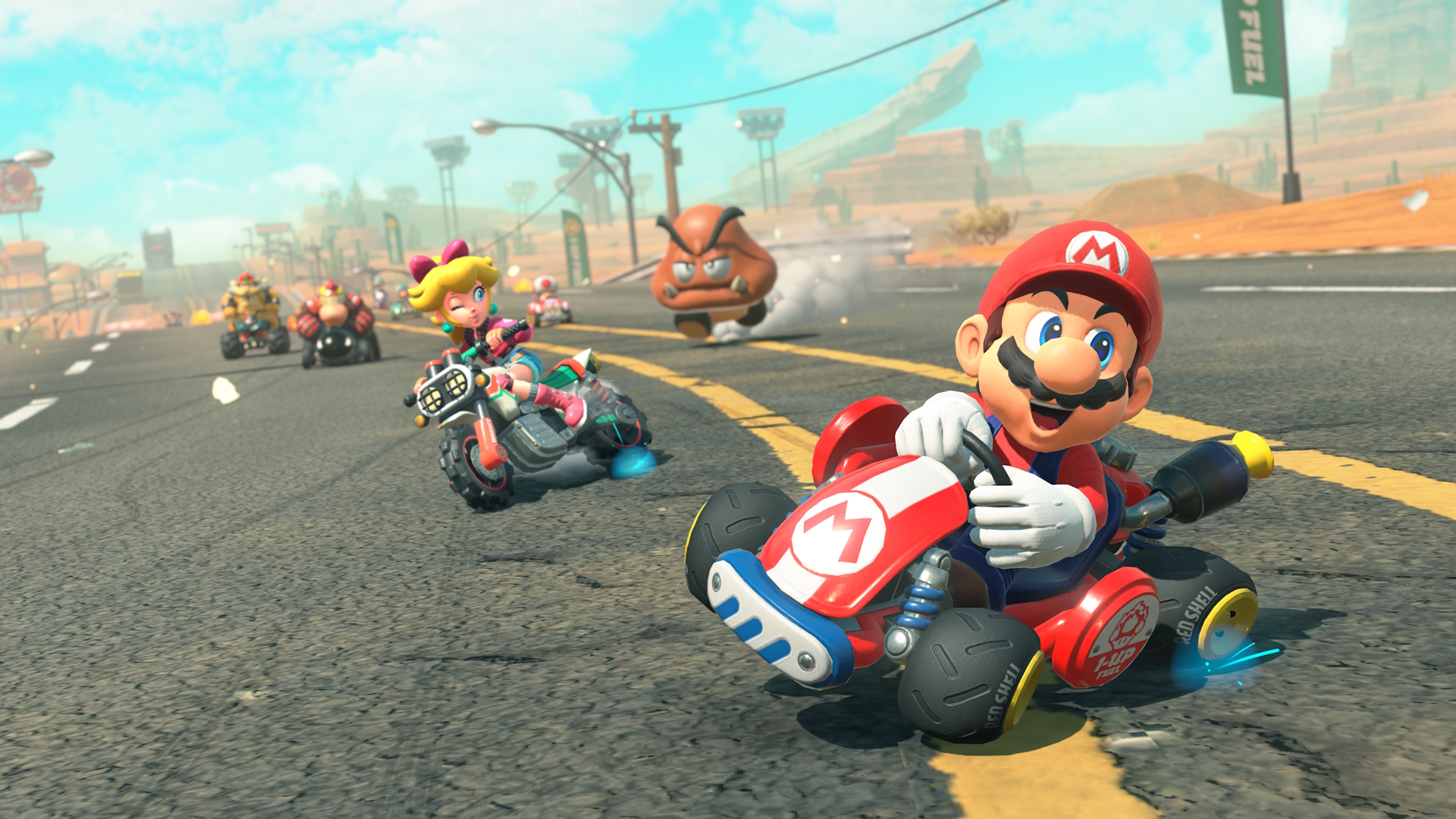 15 Jogos Imperdíveis para Co-op Local no Nintendo Switch 2 Mario e outros corredores disputando uma corrida em Mario Kart World
